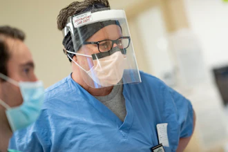Respiratory care practitioner Craig Skirvin wears a face shield at Dartmouth-Hitchcock Medical Center, Lebanon, N.H., May 1, 2020.