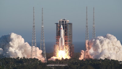 A Long March-5B rocket blasts off from the Wenchang Space Launch Center, May 5, 2020.