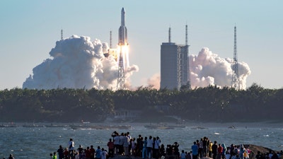 China's new large carrier rocket Long March-5B blasts off from the Wenchang Space Launch Center, May 5, 2020.