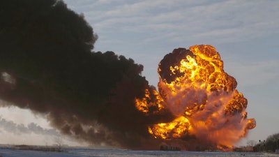 A fireball at the site of an oil train derailment near Casselton, N.D., Dec. 30, 2013.