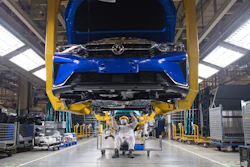 Workers at an assembly line for Dongfeng Passenger Vehicle Company in Wuhan.