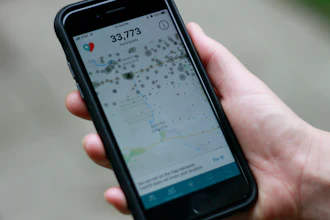 The Care19 app on a cell phone screen, May 22, 2020, Sioux Falls, S.D.