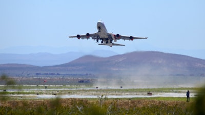Virgin Orbit's 'Cosmic Girl' Boeing 747-400 takes off from Mojave Air and Space Port north of Los Angeles, May 25, 2020.