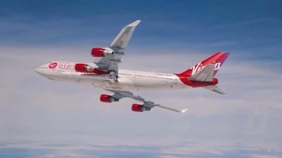 A Virgin Orbit Boeing 747 with a rocket slung beneath its port wing, April 12, 2020.
