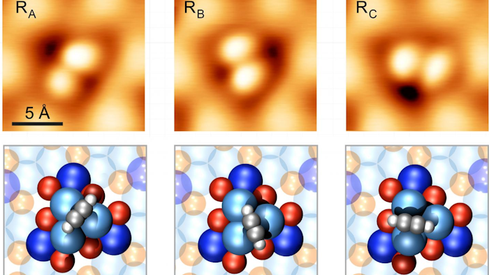 Scanning Tunneling Microscopy image (magnification about 50-million) of a PdGa surface with six dumbbell shaped acetylene-rotor molecules in different rotation states.