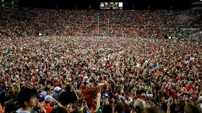 Fans storm the field after Auburn defeated Alabama 48-45 in Auburn, Ala., Nov. 30, 2019.