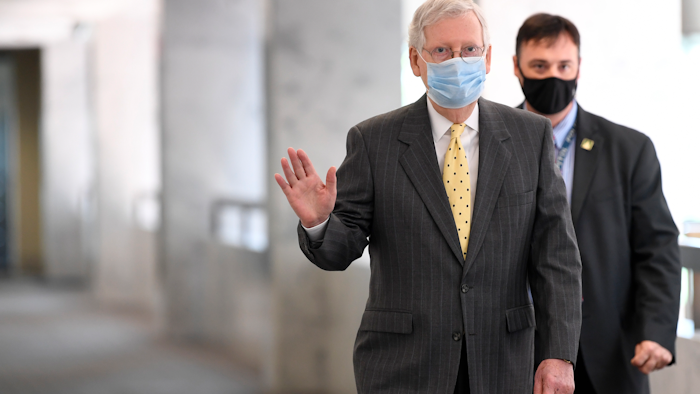 Senate Majority Leader Mitch McConnell arrives for a Republican luncheon on Capitol Hill, June 4, 2020.