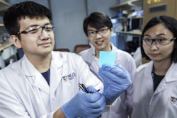 The NUS research team behind the novel electronic material: Assistant Professor Benjamin Tee, center, Wang Guanxiang, left, and Dr. Tan Yu Jun.