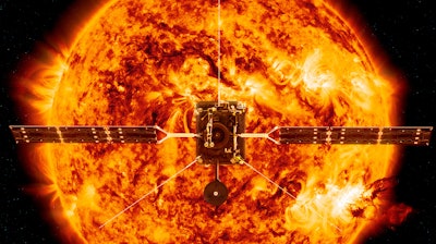 This illustration made available by NASA depicts the Solar Orbiter satellite in front of the Sun.
