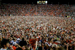 Fans storm the field after Auburn defeated Alabama 48-45 in Auburn, Ala., Nov. 30, 2019.