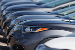 In this file photo dated Sunday, June 7, 2020, a long row of unsold cars at a Honda dealership in Highlands Ranch, USA.