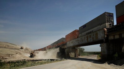 Workers expand the the BNSF Southern Transcon mainline near Matfield Green, Kan., June 18, 2020.