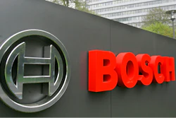 Logo of the Robert Bosch GmbH in front of the company's headquarters.