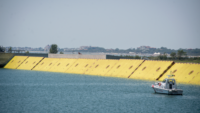 Moveable flood gates rise from the sea in the Venice lagoon, July 10, 2020.