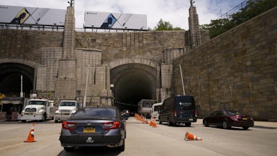 Traffic on Route 495 enters the Lincoln Tunnel en route to New York City, Weehauken, N.J., June 21, 2018.