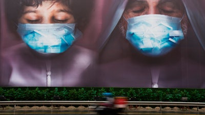 Billboard urging people to stay home due to the coronavirus pandemic in Dubai, April 15, 2020.