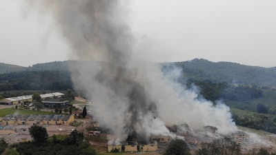 Smoke billows from a fire following an explosion at a fireworks factory outside the town of Hendek, Sakarya province, northwestern Turkey, Friday July 3, 2020. There were an estimated 150 workers at the factory, Gov. Cetin Oktay Kaldirim told state-run Anadolu Agency. Several firefighters and ambulances were sent to the factory, which is away from residential areas, but explosions continued to hamper efforts to bring the fire under control. The cause of the blast wasn't immediately known.