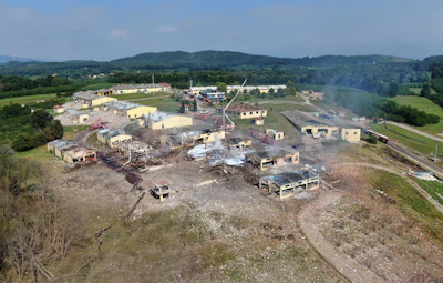 A view of destroyed buildings at a fireworks factory following a fire after an explosion outside the town of Hendek, Sakarya province, northwestern Turkey, Friday, July 3, 2020. There were an estimated 150 workers at the factory, Gov. Cetin Oktay Kaldirim told state-run Anadolu Agency. Several firefighters and ambulances were sent to the factory, which is away from residential areas. However, explosions were continuing, hampering efforts to bring the fire under control.The cause of the blast wasn't immediately known.