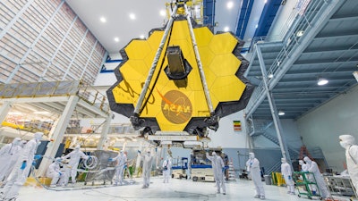 Technicians lift the mirror assembly of the James Webb Space Telescope at NASA's Goddard Space Flight Center, Greenbelt, Md., in 2017.