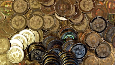 Bitcoin tokens in Sandy, Utah, April 3, 2013.