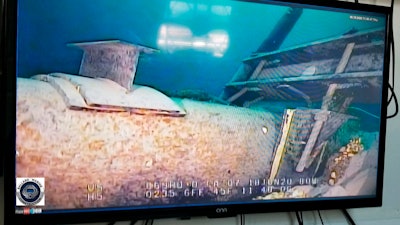 This June 2020 file photo, shot from a television screen, shows damage to anchor support EP-17-1 on the east leg of the Enbridge Line 5 pipeline within the Straits of Mackinac in Michigan.