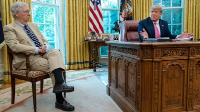 Senate Majority Leader Mitch McConnell, R-Ky., and President Donald Trump during a meeting in the Oval Office of the White House, July 20, 2020.