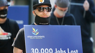 Special events workers, forced out of work because of the COVID-19 pandemic, marching in Salt Lake City, July 21, 2020.