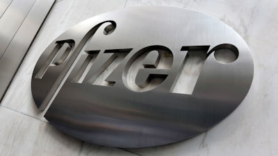 Pfizer company logo at the company's headquarters in New York.