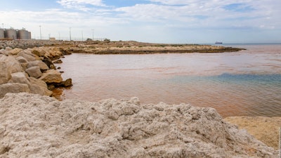 In this photo made available by the Fire brigade of Marseille, an orange-brown sheet of pollution in the Mediterranean Sea at Martigues, France, July 23, 2020.