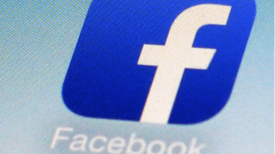 Facebook app icon on a smartphone in New York, Feb. 19, 2014.