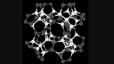 Geometric structure of pentadiamond. White and black balls indicate C atoms with four and three adjacent C atoms, respectively.
