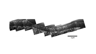 The material (thick gray line in the center of the image) derived from e-waste remained intact when indented, and increased the hardness of the steel below it.