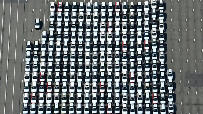 Vehicles parked at a logistics center in Kawasaki, Japan, Aug. 17, 2020.