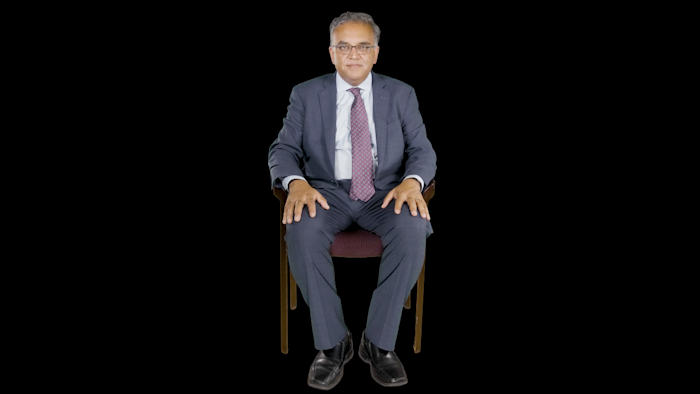 Ashish K. Jha, director of the Harvard Global Health Institute, in an interactive exhibit from Boston's Museum of Science.
