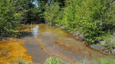 Acid mine drainage pollution in a stream in Cambria Co., Pa.