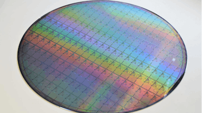 A wafer filled with memristors.