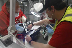 Ford Motor Co. employees work on a ventilator at the Rawsonville plant, Ypsilanti Township, Mich., May 13, 2020.