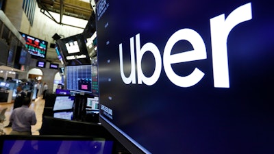 The logo for Uber above a trading post on the floor of the New York Stock Exchange, Aug. 9, 2019.