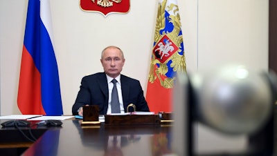 Russian President Vladimir Putin attends a cabinet meeting at the Novo-Ogaryovo residence outside Moscow, Aug. 11, 2020.