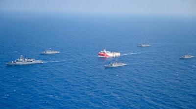 Turkish research vessel Oruc Reis, surrounded by Turkish navy vessels, Aug 10, 2020.