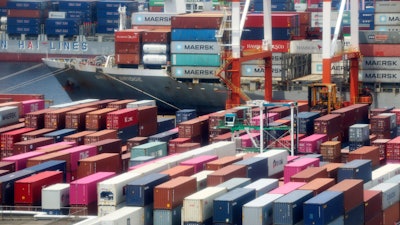 Containers are piled up at the port in Yokohama, Japan, June 17, 2020.