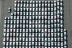 Vehicles parked at a logistics center in Kawasaki, Japan, Aug. 17, 2020.