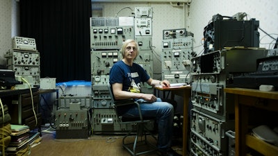 Jens Raeder with his restored Soviet shortwave transmitter, Harnekop, Germany, Aug. 12, 2020.