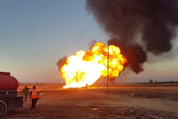 In this photo released by the Syrian official news agency, flames rise from a gas pipeline hit by an explosion between the northeastern Damascus suburbs of Adra and Dumair, Aug. 24, 2020.
