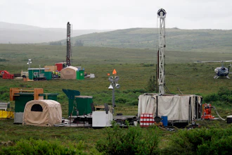 Workers with the Pebble Mine project test drill in the Bristol Bay region near the village of Iliamma, Alaska, July 13, 2007.