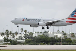 An American Airlines Boeing 737-823 lands at Miami International Airport, July 27, 2020.
