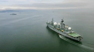 In this undated video grab provided by Russian Defense Ministry Press Service, Russian warships take part in maneuvers in the Bering Sea.