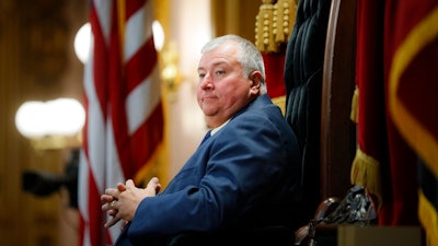 Republican Ohio state Rep. Larry Householder sits at the head of a legislative session as Speaker of the House, in Columbus, Ohio, Wednesday, Oct. 30, 2019. Householder, who is accused in a $60 million federal bribery probe, was removed from his leadership position on July 30, 2020.