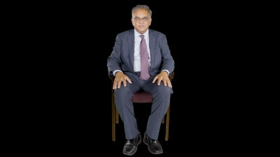 Ashish K. Jha, director of the Harvard Global Health Institute, in an interactive exhibit from Boston's Museum of Science.
