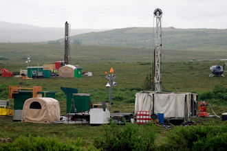 Workers with the Pebble Mine project test drill in the Bristol Bay region near the village of Iliamma, Alaska, July 13, 2007.
